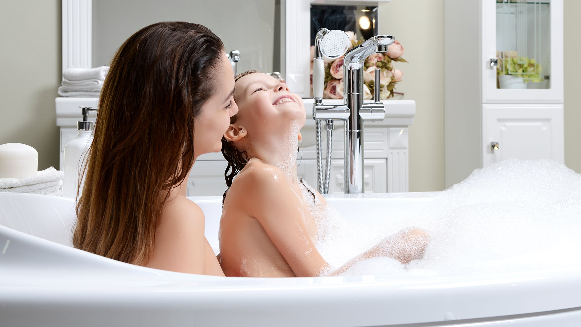 Mom and baby bathing